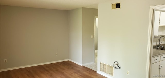 3152 Gentilly Ct, Montgomery, AL 36116 - unfurnished room with a sink and wood finished floors