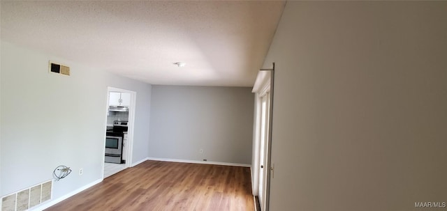 3152 Gentilly Ct, Montgomery, AL 36116 - spare room featuring wood finished floors and baseboards