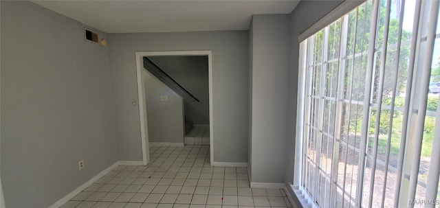 3152 Gentilly Ct, Montgomery, AL 36116 - hallway with light tile patterned floors and baseboards