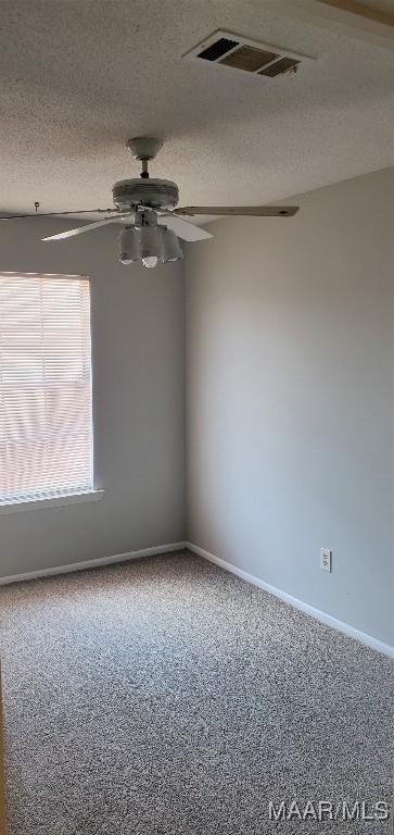3152 Gentilly Ct, Montgomery, AL 36116 - spare room with carpet floors, ceiling fan, and a textured ceiling