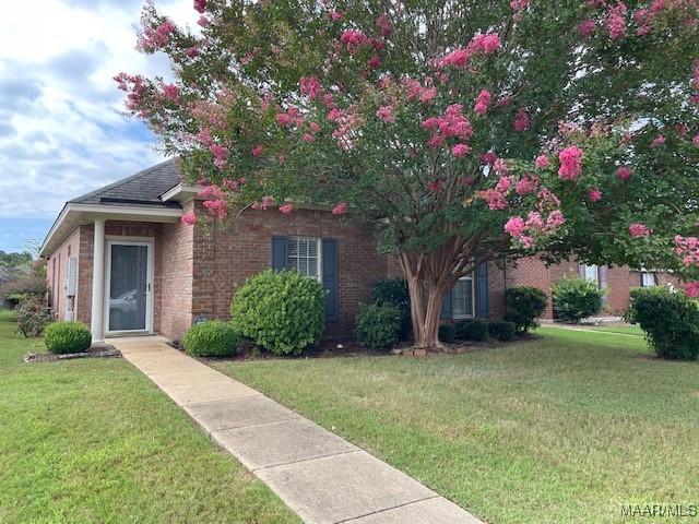 8824 Templeton Ct, Montgomery, AL 36117 - view of front of property with a front yard and brick siding