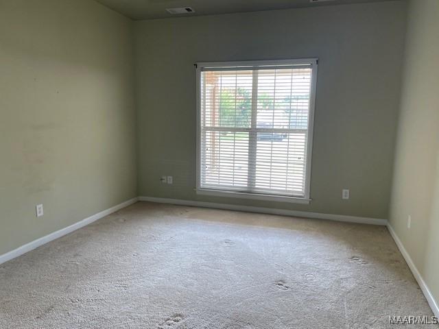 8824 Templeton Ct, Montgomery, AL 36117 - spare room with carpet flooring and baseboards