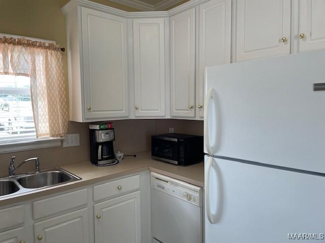 8824 Templeton Ct, Montgomery, AL 36117 - kitchen with white appliances, white cabinetry, and light countertops