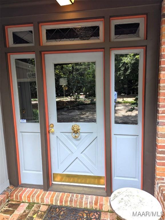 1672 Gilmer Ave, Montgomery, AL 36104 - property entrance featuring brick siding
