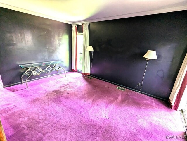 1672 Gilmer Ave, Montgomery, AL 36104 - carpeted spare room with ornamental molding