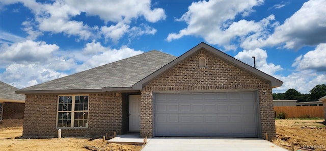 75 Gaines Ct, Wetumpka, AL 36092 - single story home featuring brick siding, driveway, a garage, and a shingled roof