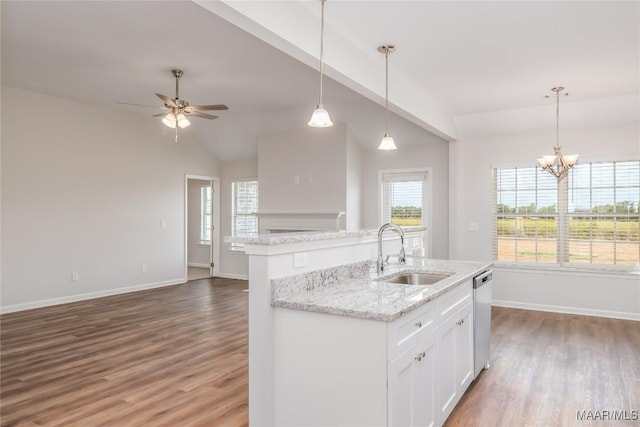 75 Gaines Ct, Wetumpka, AL 36092 - kitchen with lofted ceiling, wood finished floors, a ceiling fan, dishwasher, and white cabinetry