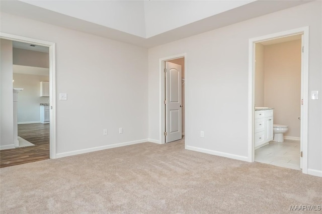 75 Gaines Ct, Wetumpka, AL 36092 - unfurnished bedroom featuring light colored carpet, connected bathroom, and a walk in closet