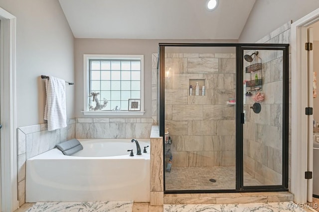 905 Overture Dr, Montgomery, AL 36117 - bathroom with a bath, a shower stall, and vaulted ceiling