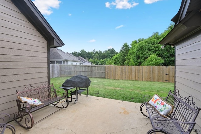 905 Overture Dr, Montgomery, AL 36117 - fenced backyard featuring a patio and grilling area