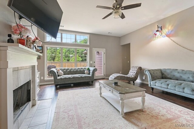 905 Overture Dr, Montgomery, AL 36117 - living room with hardwood / wood-style flooring, ceiling fan, and a tiled fireplace
