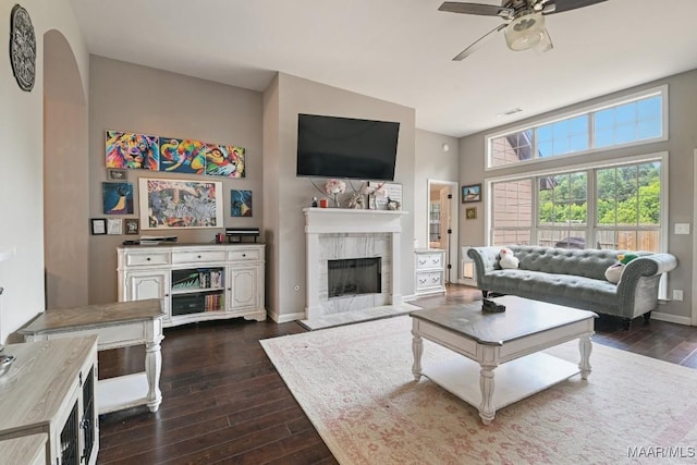 905 Overture Dr, Montgomery, AL 36117 - living room featuring dark wood finished floors, a fireplace, and a ceiling fan