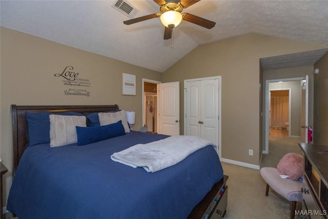 6209 Sycamore Dr, Montgomery, AL 36117 - carpeted bedroom featuring vaulted ceiling, a closet, and a ceiling fan