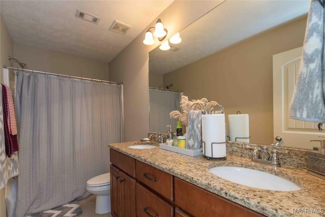 6209 Sycamore Dr, Montgomery, AL 36117 - bathroom with toilet and double vanity