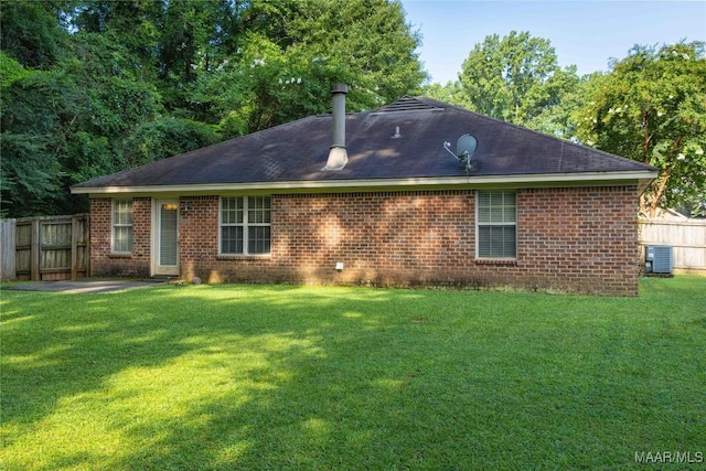 6209 Sycamore Dr, Montgomery, AL 36117 - back of house with brick siding and roof with shingles