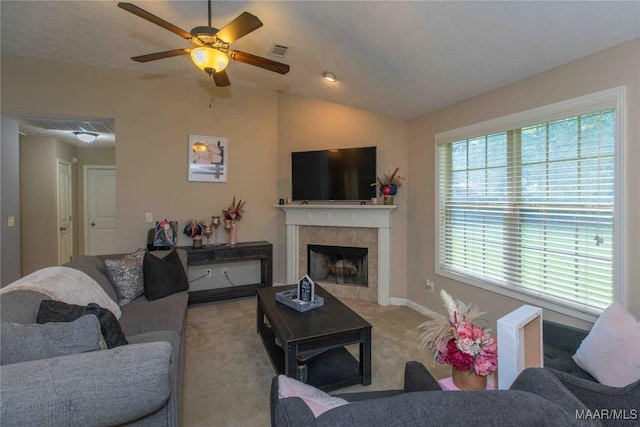 6209 Sycamore Dr, Montgomery, AL 36117 - carpeted living room featuring ceiling fan, a fireplace, and vaulted ceiling