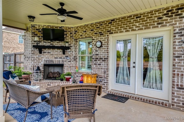 235 Midland Dr, Wetumpka, AL 36093 - view of patio with an outdoor brick fireplace, a ceiling fan, and french doors