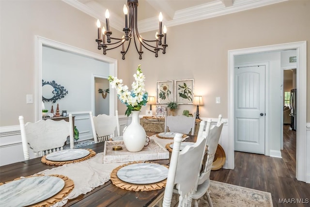 235 Midland Dr, Wetumpka, AL 36093 - dining space with crown molding, a chandelier, dark wood-type flooring, and wainscoting