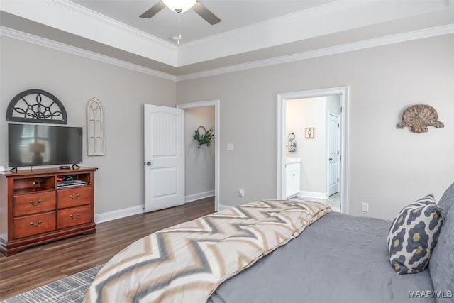 235 Midland Dr, Wetumpka, AL 36093 - bedroom with wood finished floors, ornamental molding, ensuite bath, ceiling fan, and a tray ceiling