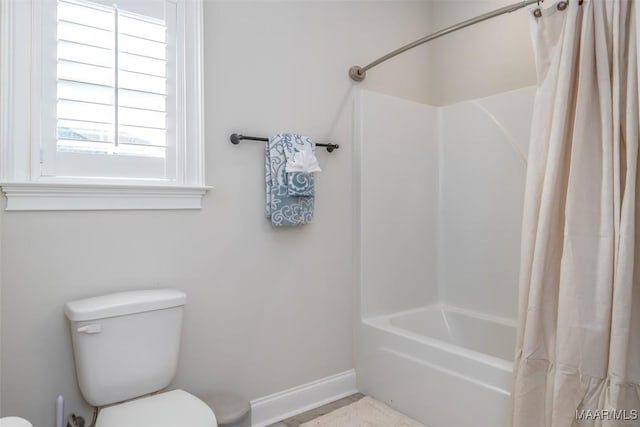 235 Midland Dr, Wetumpka, AL 36093 - bathroom with toilet and shower / tub combo