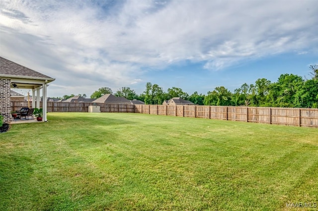 235 Midland Dr, Wetumpka, AL 36093 - fenced backyard featuring a patio area