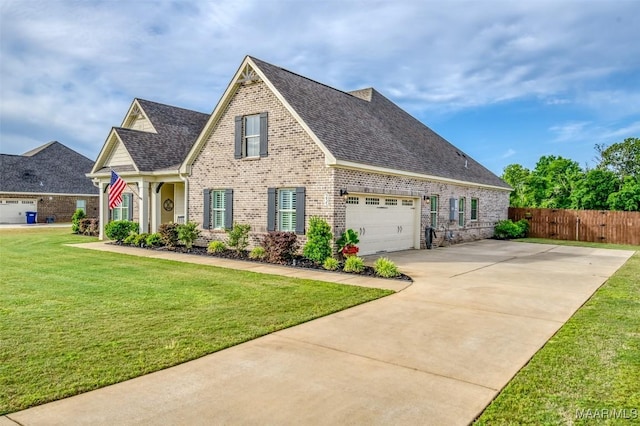 235 Midland Dr, Wetumpka, AL 36093 - view of front of home featuring brick siding, driveway, and a shingled roof