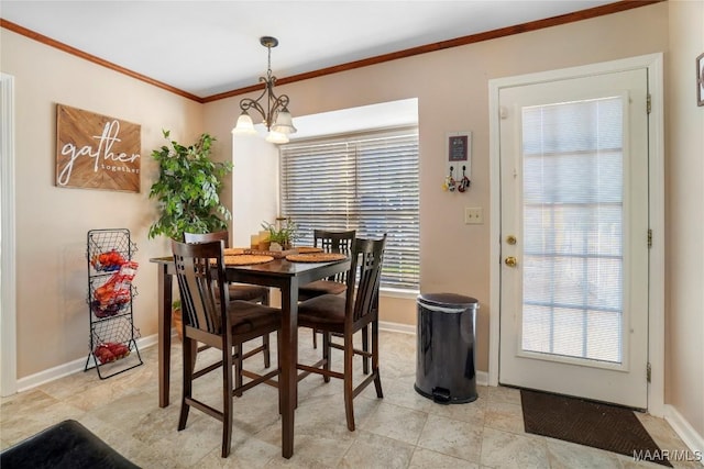 1825 W Astrid Pl, Montgomery, AL 36117 - dining space featuring a chandelier, crown molding, and light tile patterned floors