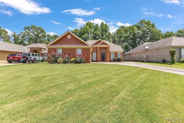 8049 Copperfield Dr, Montgomery, AL 36117 - single story home featuring brick siding and a front lawn