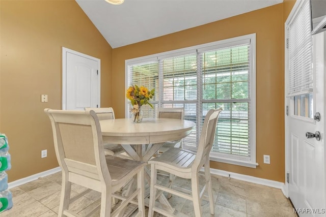 8049 Copperfield Dr, Montgomery, AL 36117 - dining room featuring baseboards and lofted ceiling