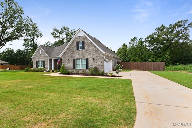 311 Alston Dr, Wetumpka, AL 36093 - craftsman inspired home featuring concrete driveway, brick siding, and a garage