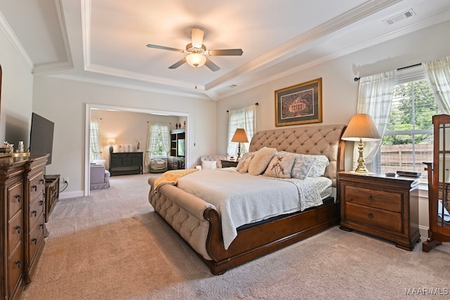 311 Alston Dr, Wetumpka, AL 36093 - bedroom with light carpet, a raised ceiling, crown molding, and a ceiling fan