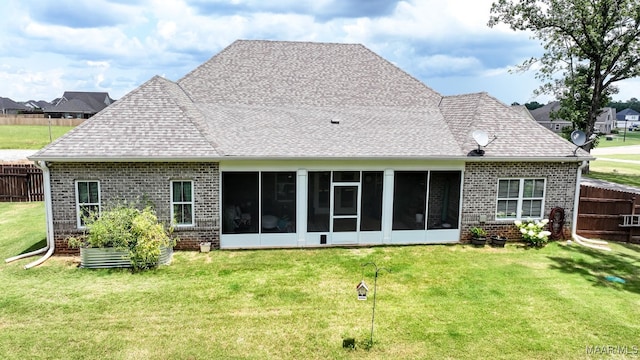 311 Alston Dr, Wetumpka, AL 36093 - back of property featuring brick siding, a sunroom, and roof with shingles