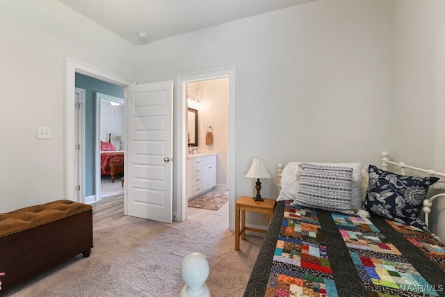 311 Alston Dr, Wetumpka, AL 36093 - bedroom with light colored carpet and ensuite bathroom