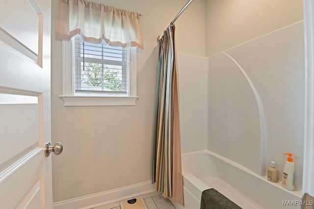 311 Alston Dr, Wetumpka, AL 36093 - full bathroom featuring shower / bath combination with curtain and baseboards