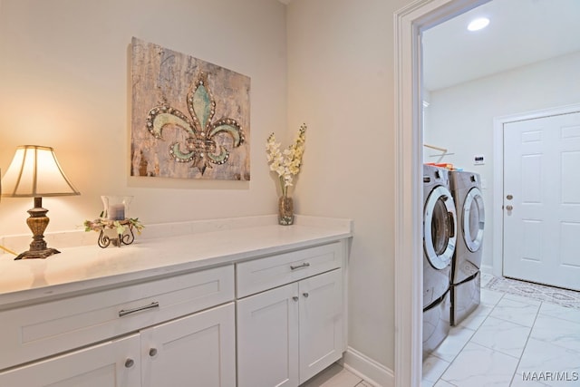 311 Alston Dr, Wetumpka, AL 36093 - laundry area featuring independent washer and dryer and light marble finish flooring