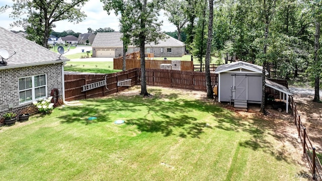 311 Alston Dr, Wetumpka, AL 36093 - fenced backyard featuring a storage unit