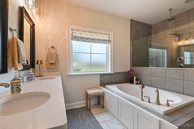 311 Alston Dr, Wetumpka, AL 36093 - bathroom featuring a bath, a tile shower, double vanity, and marble look tile flooring