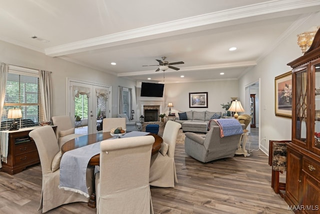 311 Alston Dr, Wetumpka, AL 36093 - dining space with french doors, wood finished floors, recessed lighting, a brick fireplace, and ceiling fan
