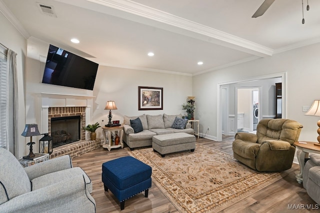 311 Alston Dr, Wetumpka, AL 36093 - living area featuring recessed lighting, wood finished floors, a ceiling fan, crown molding, and a fireplace