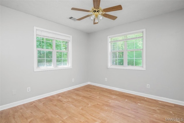 215 Hunters Rd, Eclectic, AL 36024 - unfurnished room with light wood finished floors and ceiling fan
