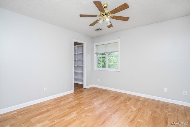 215 Hunters Rd, Eclectic, AL 36024 - spare room featuring light wood finished floors and a ceiling fan