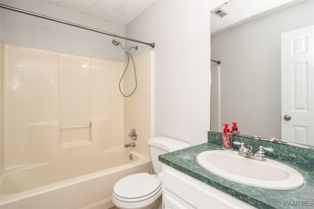 215 Hunters Rd, Eclectic, AL 36024 - full bathroom featuring vanity, shower / tub combination, and a textured ceiling