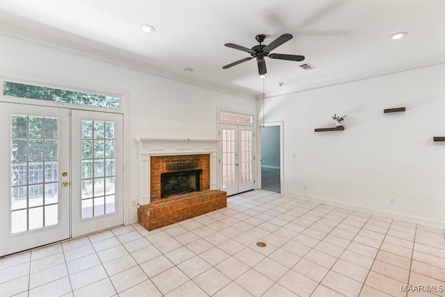 7930 Mossy Oak Dr, Montgomery, AL 36117 - unfurnished living room featuring french doors, ceiling fan, ornamental molding, a fireplace, and light tile patterned flooring