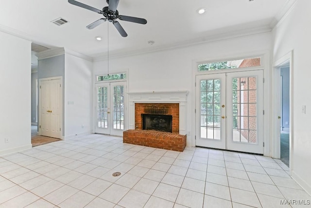 7930 Mossy Oak Dr, Montgomery, AL 36117 - unfurnished living room with french doors, crown molding, ceiling fan, light tile patterned floors, and a fireplace