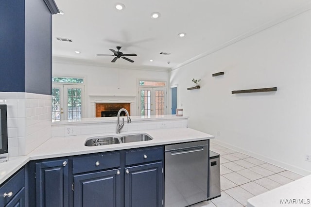 7930 Mossy Oak Dr, Montgomery, AL 36117 - kitchen featuring stainless steel dishwasher, blue cabinets, a ceiling fan, crown molding, and french doors