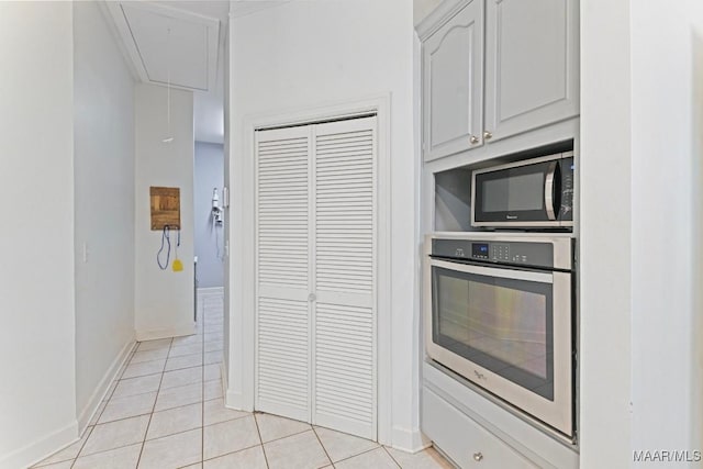 7930 Mossy Oak Dr, Montgomery, AL 36117 - kitchen with stainless steel appliances and light tile patterned floors