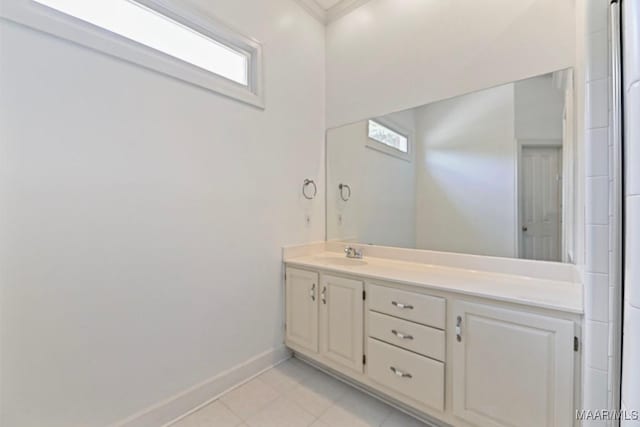 7930 Mossy Oak Dr, Montgomery, AL 36117 - bathroom featuring double vanity, healthy amount of natural light, ornamental molding, and tile patterned floors