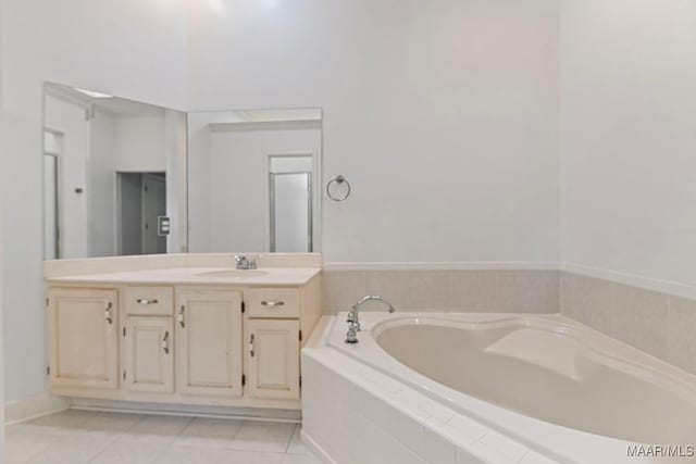 7930 Mossy Oak Dr, Montgomery, AL 36117 - full bath with vanity, a garden tub, and tile patterned floors