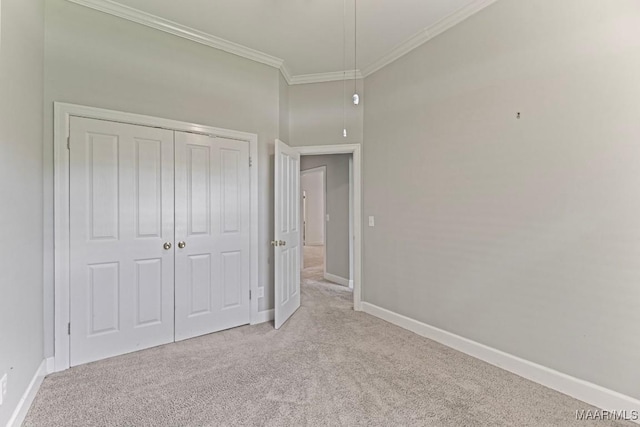 7930 Mossy Oak Dr, Montgomery, AL 36117 - unfurnished bedroom with carpet, ornamental molding, a closet, and attic access