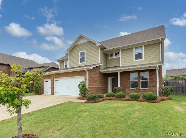 1531 Wingate Park Ct, Montgomery, AL 36117 - view of front of home with driveway, brick siding, and a garage